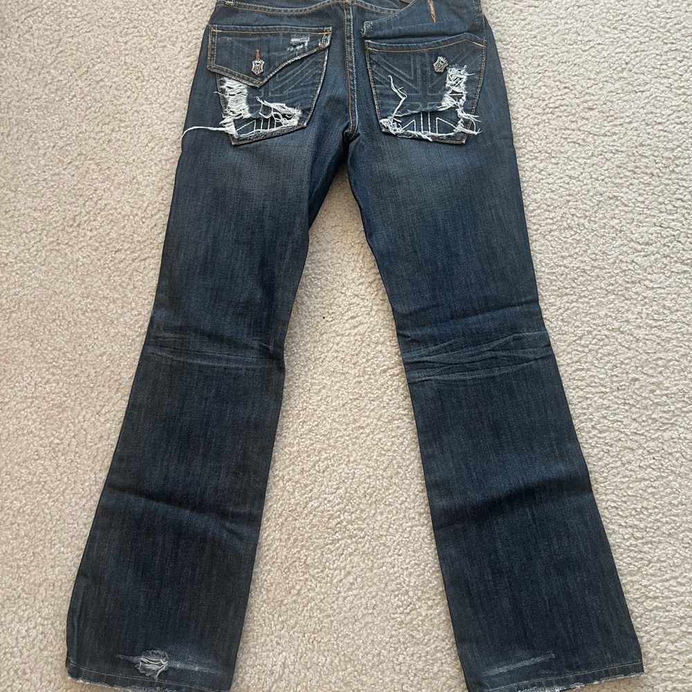Stylish Blue Jeans with Distressed Detailing